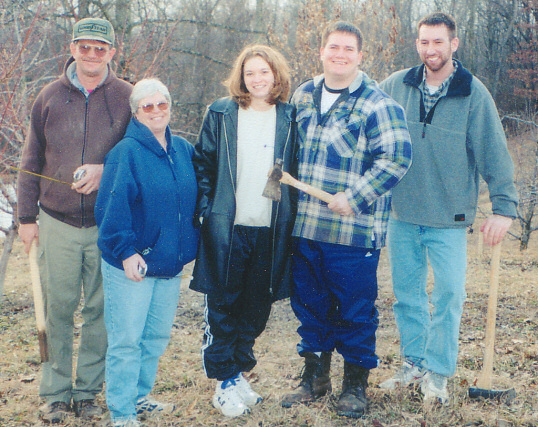 The Thomas Family While Finishing the Cabin in the Orchard